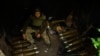 Військовослужбовець 59-ї окремої мотопіхотної бригади ЗСУ сидить біля артилерійських боєприпасів на позиції на Авдіївському напрямку, Україна, 6 травня 2024 року