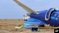 The wreckage of an Azerbaijan Airlines Embraer 190 lies on the ground near the airport of Aktau, Kazakhstan, on December 26.
