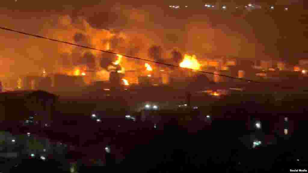 Storage tanks burn in the Tuapse refinery on April 20.Ukraine has targeted Russia's oil facilities in recent months apparently seeking to disrupt Moscow's ability to profit from the spike in energy prices caused by the Iran war.