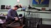 A picture taken in 2015 shows member of the Russian Imperial Movement in eastern Ukraine holding a weapon simulator at a training base in St. Petersburg.