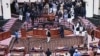 WATCH: Afghan Lawmakers Brawl As New Speaker Tries To Take Seat