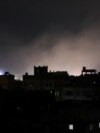 Dust rises from the site of US strikes in Sanaa, the Yemeni capital, on March 15.