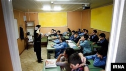 An elementary school classroom in Iran, undated.