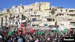 Protesters from opposition parties shout slogans against the government at a demonstration January 21.