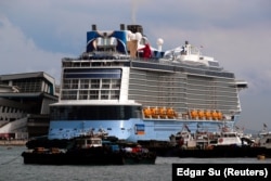 Numeroase croaziere au fost întrerupte în timpul pandemiei. În imagine, Royal Caribbean's Quantum of the Seas în Singapore, după ce un pacient a fost testat pozitiv cu Covid. 9 decembrie 2020