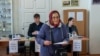 Moldova: Romanian election, vote in R. Moldova, people at polling station in Ialoveni