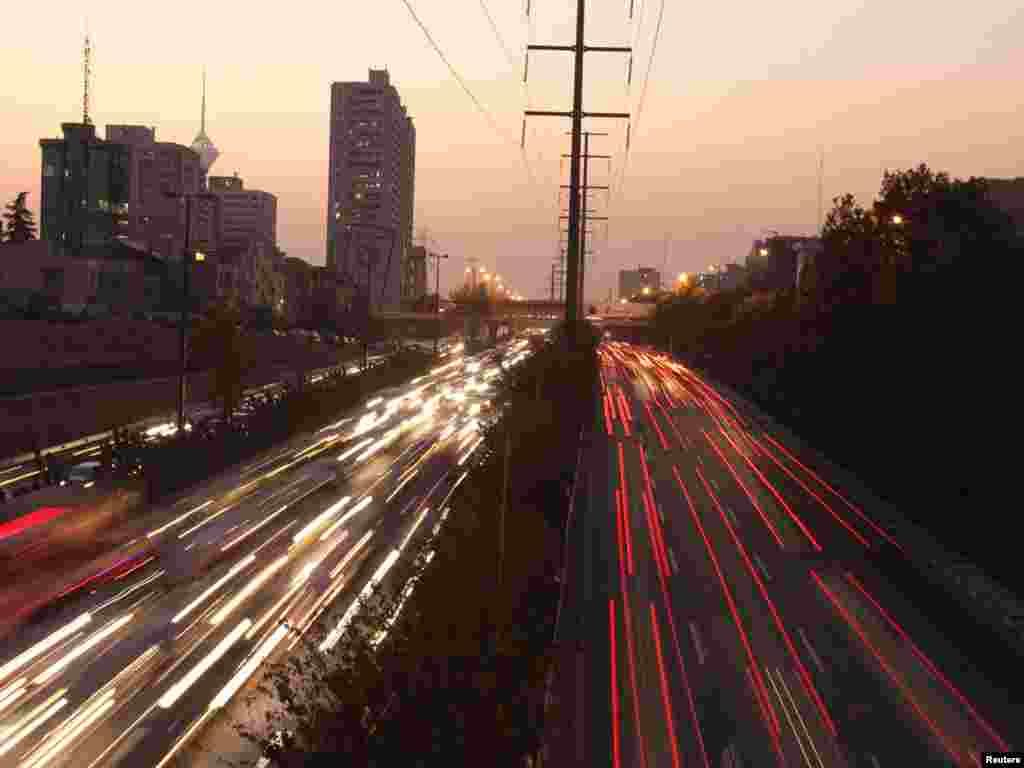 Motorists are a blur on a highway in Tehran, Iran. Photo by Raheb Homavandi for Reuters