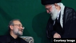 علی لاریجانی، دبیر شورای عالی امنیت ملی (سمت چپ)