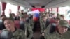 Российские военнослужащие после очередного обмена пленными