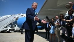 US President Donald Trump speaks to reporters after stepping off Air Force One at Joint Base Andrews, Maryland, on May.
