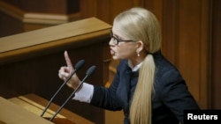 Former Ukrainian prime minister and the leader of Batkivshchyna (Fatherland) party, Yulia Tymoshenko, speaks in parliament on March 29.