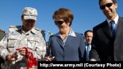 U.S. Ambassador Susan Elliott (center) attends the opening of two new border-guard facilities in Tajikistan. (file photo)