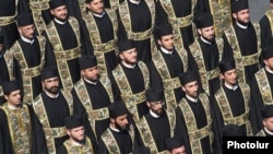 Armenia - Armenian Apostolic Church chaplains march during a military parade in Yerevan, September 21, 2011.