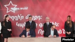 Armenia - Former President Serzh Sarkissian and former National Security Service Director Artur Vanetsian look on as their political parties officially set up an electoral alliance at a ceremony outside Yerevan, May15, 2021.