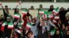 IRAN -- Iranian women - most of them family of players, federation employees and relatives, arrive as are allowed for the first time to take part at thea friendly soccer match between Iran and Bolivia at the Azadi Stadium in Tehran, October 16, 2018