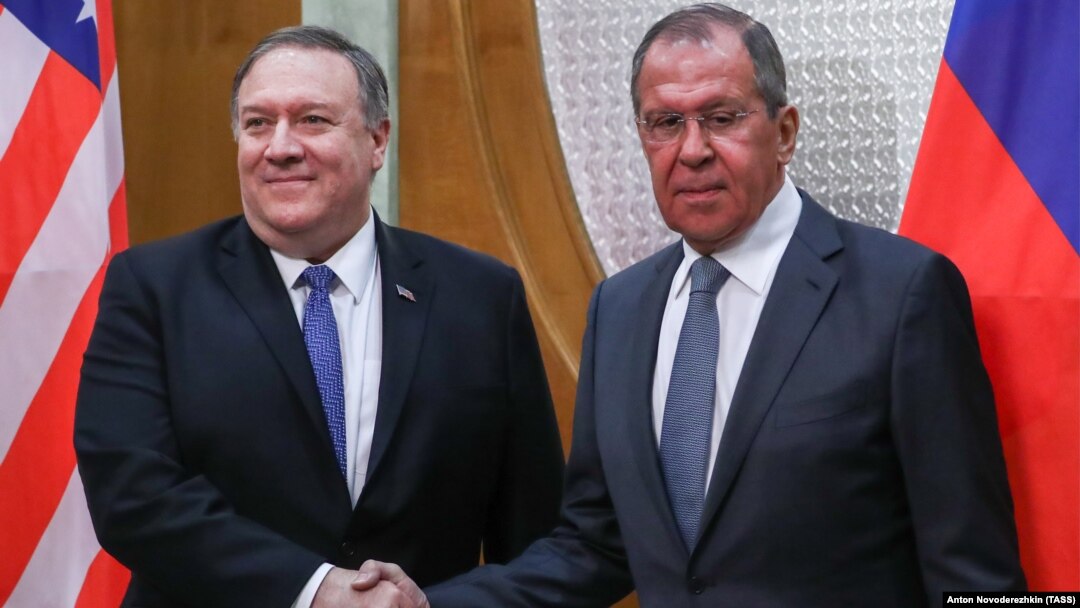U.S. Secretary of State Mike Pompeo (left) and Russian Foreign Minister Sergei Lavrov shake hands as they pose for a photo prior to their talks in the Russian city of Sochi in May.
