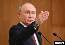 Vladimir Putin.