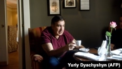 Former Georgian President Mikheil Saakashvili drinks coffee in the lobby of his hotel in the central western Ukrainian city of Lviv on September 11.