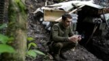 A Ukrainian soldier rests at a position near the front line in the Donetsk region on May 28.