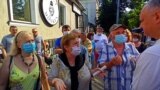 Moldovans Line Up For Vaccine Shot As Ex-President Walks By
