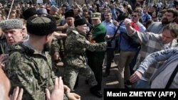 Столкновения между участниками акции «Он нам не царь» и казаками на Пушкинской площади в Москве 