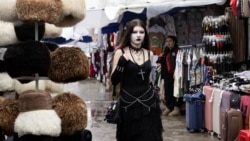 A woman walks through a market in Ashgabat, Turkmenistan on March 17. 