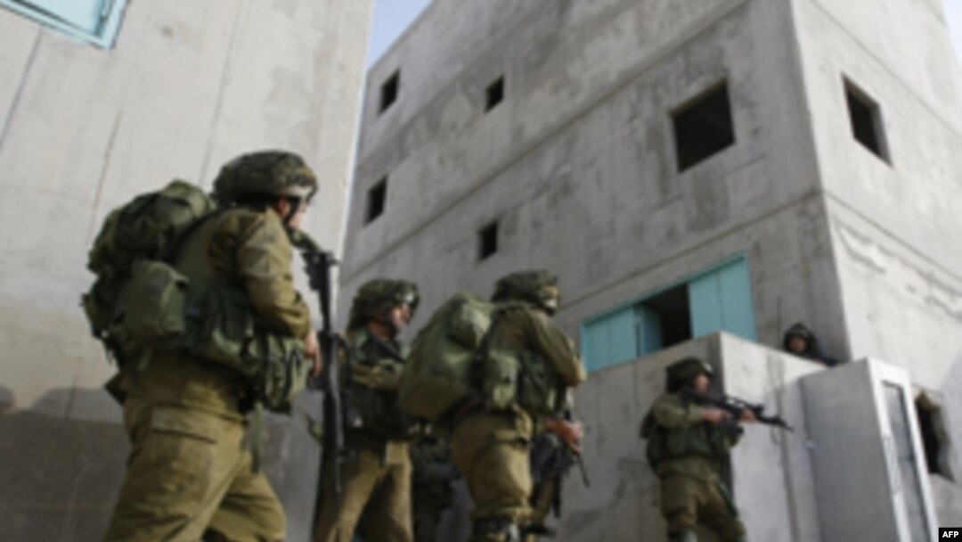 Israeli Army reservists practice at the Urban Warfare Training Center in southern Israel on January 11.