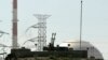 An anti aircraft gun is seen at the reactor building of the Bushehr nuclear power plant, February 26, 2018