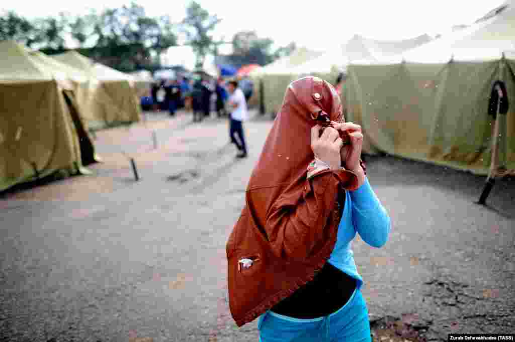 Rusija - U čistkama policije u Moskvi uhapšen je veliki broj ilegalnih migranata, 5. august 2013. Foto: ITAR-TASS / Zurab Džavahadže 