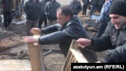 Armenia - Protesters destroy drilling samples at a would-be iron mine near Hrazdan, 9Nov2011.
