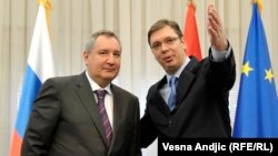 Dmitry Rogozin (L) and Aleksandar Vucic (R)