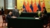 China - The governors of the central banks of China and Armenia sign a currency swap agreement in the presence of Chinese President Xi Jinping and his visiting Armenian counterpart Serzh Sarkisian, Beijing, 25Mar2015.