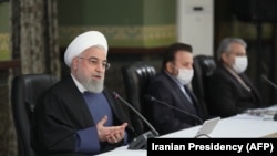 A handout picture provided by the Iranian Presidency on April 15, 2020, shows Iranian President Hassan Rouhani chairing a cabinet session in Tehran.