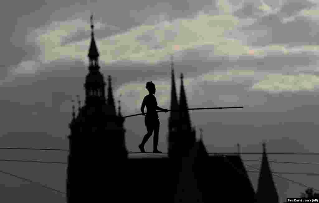 French tightrope walker Tatiana-Mosio Bongoga balances over the Vltava River during her performance to open an international circus festival in Prague. (AP/Petr David Josek)