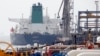 IRAN -- An Panamanian tanker docks at the platform of the oil facility in the Khark Island, on the shore of the Gulf, March 12, 2017