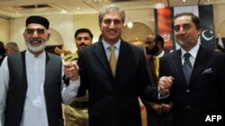 Pakistani Foreign Minister Shah Mehmood Qureshi (center), Afghan delegation head Abdullah Abdullah (right), and Northwest Frontier Province Governor Owais Ghani at the meeting in Islamabad