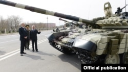 Azerbaijan - President Ilham Aliyev inspects T-90 tanks and other weapons purchased from Russia at a military base in Nakhichevan, 7Apr2014.