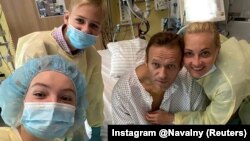 Opposition politician Aleksei Navalny poses for a picture at Charite hospital in Berlin, where he is recovering after being poisoned in Russia.