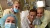 Russian opposition politician Aleksei Navalny and his family members pose for a picture at the Charite hospital in Berlin on September 15.