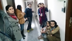 Azerbaijan -- Baku Bureau journalists pushed out from office, Baku 26Dec2014
