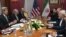 U.S. Secretary of State John Kerry (left) holds a meeting with Iran's Foreign Minister Javad Zarif (right) over Iran's nuclear program in Lausanne, Switzerland, on March 17.