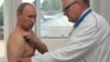 Russia – Vladimir Putin (L) receives consultation from traumatologist Viktor Petrachenkov during his visit to Smolensk Regional Hospital, 25Aug2011