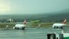 Georgia -- Georgian and Russian passenger jets at Tbilisi international airport.