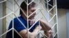 Volodymyr Balukh appears in Crimea's Rozdolne district court on May 15.