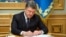 Ukrainian President Petro Poroshenko signed the new legislation into law on September 25. (illustrative photo)