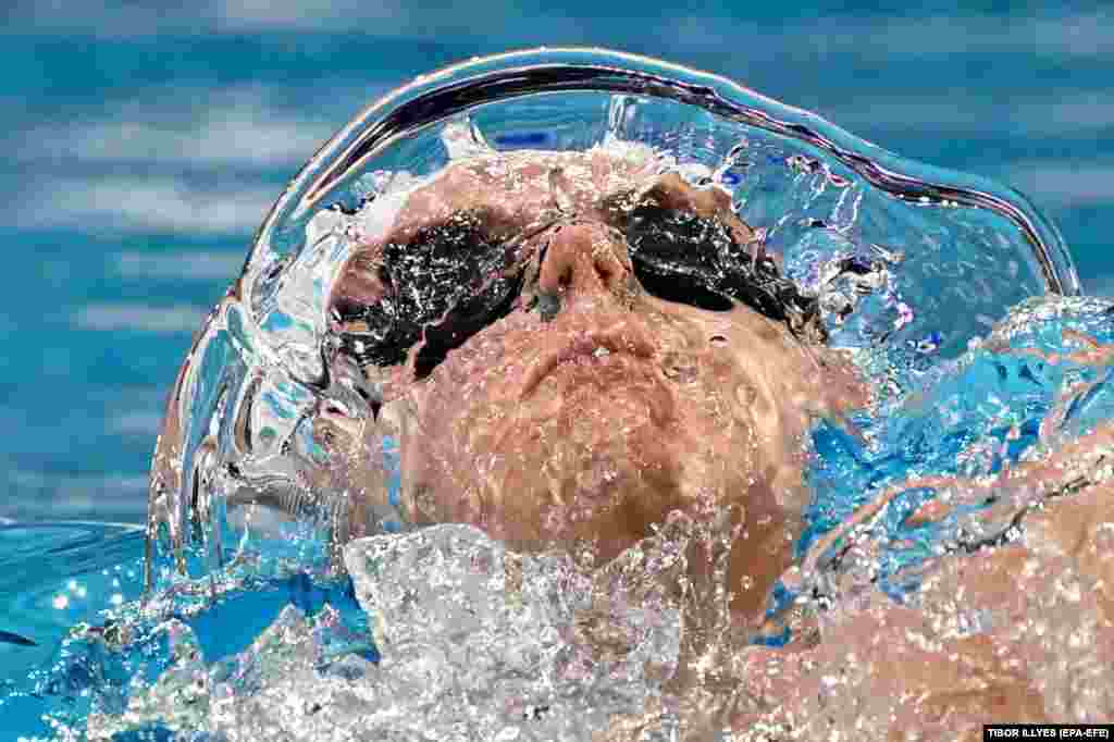  Leo Gudmundur Rafnsson of Iceland competes in a heat of the Men&#39;s 100m Backstroke at the World Aquatics Swimming Championships in Budapest. &nbsp; 