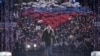 Vlagyimir Putyin orosz elnök részt vesz a Krím Oroszország általi annektálásának hetedik évfordulója alkalmából rendezett koncerten Moszkvában, a Luzsnyiki Stadionban, 2021. március 18-án