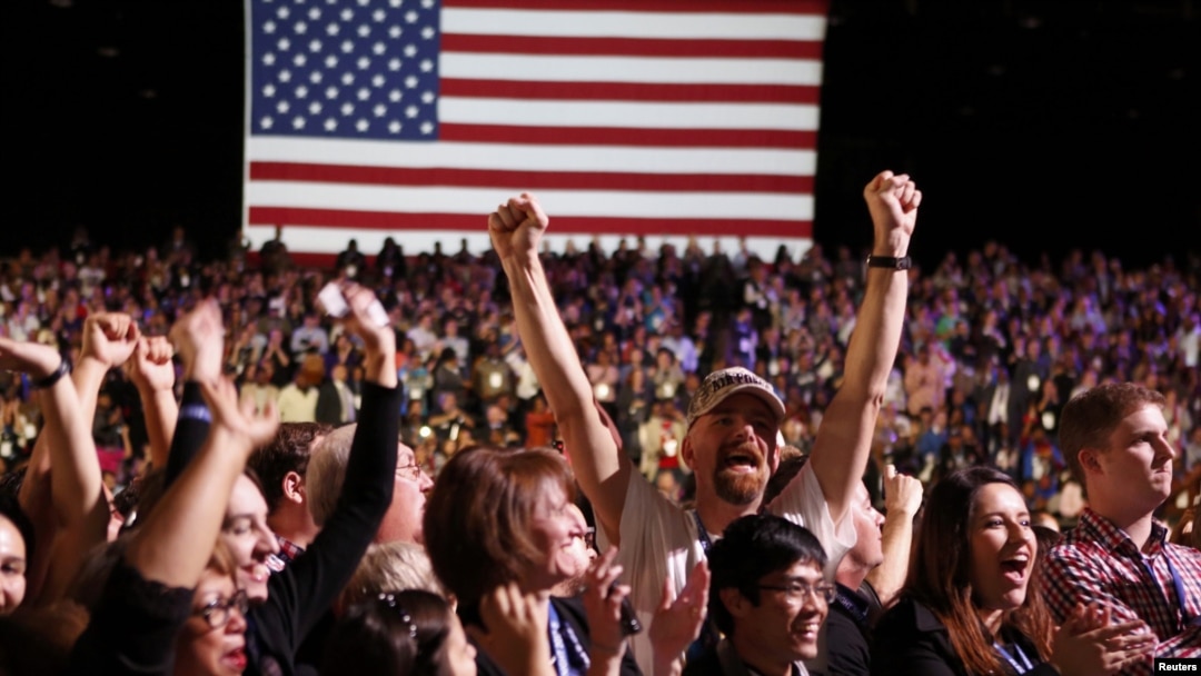 Supporters of President Barack Obama cheer during his election night rally in Chicago on November 6.