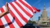 POLAND -- People wave as the Beast, US presidential Cadillac One limousine, carrying U.S. President Donald J. Trump heads to the meeting with Polish President Andrzej Duda at the Royal Palace in Warsaw, Poland, Poland, 06 July 2017. 