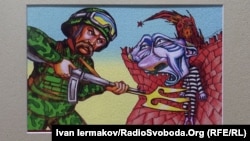 Одна з художніх робіт на виставці плакатів «Шевченко: 4.5.0», присвячена війні і постаті Тараса Шевченка. Київ, червень 2022 року